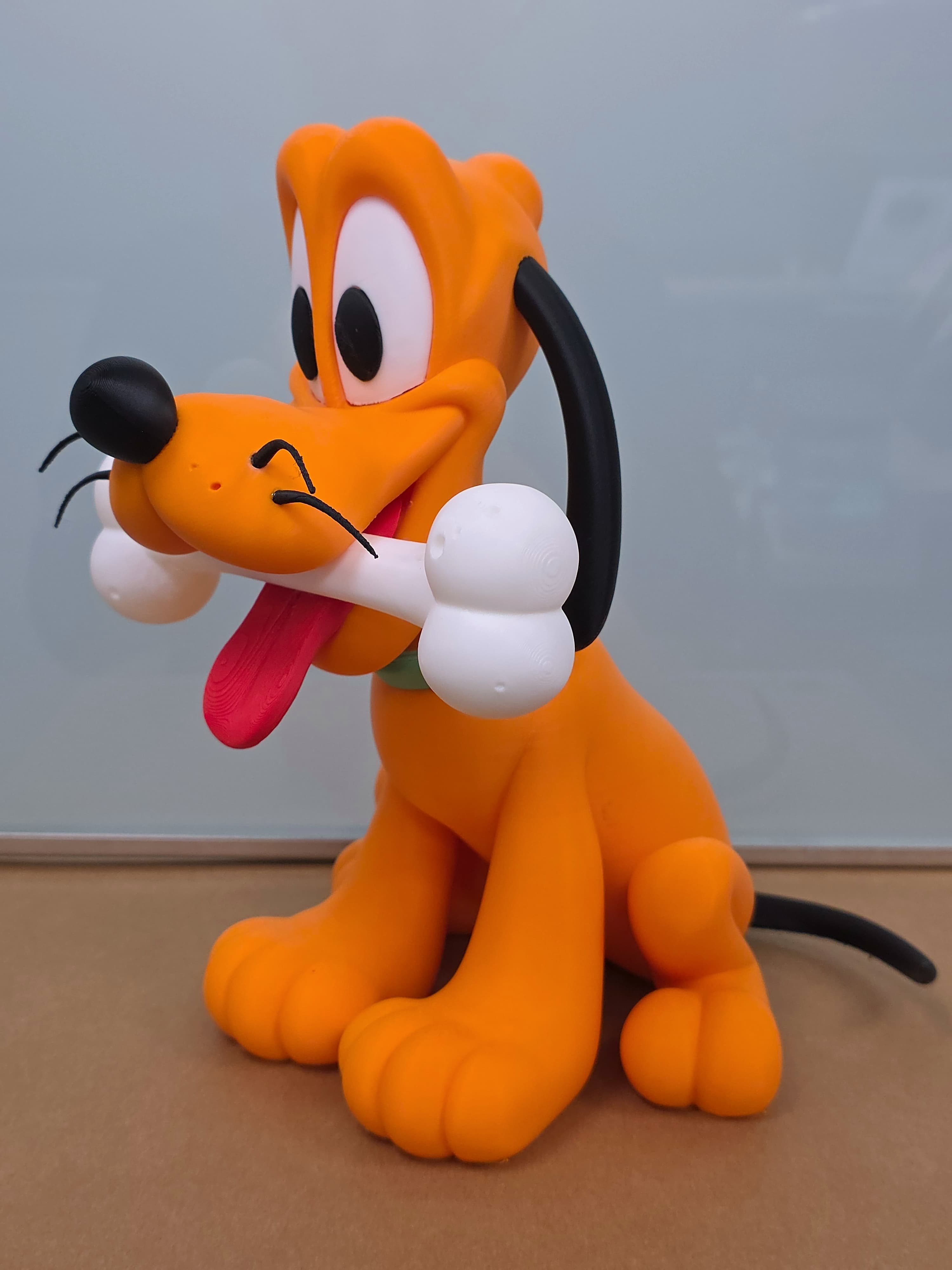 Pluto — figurine multicolore