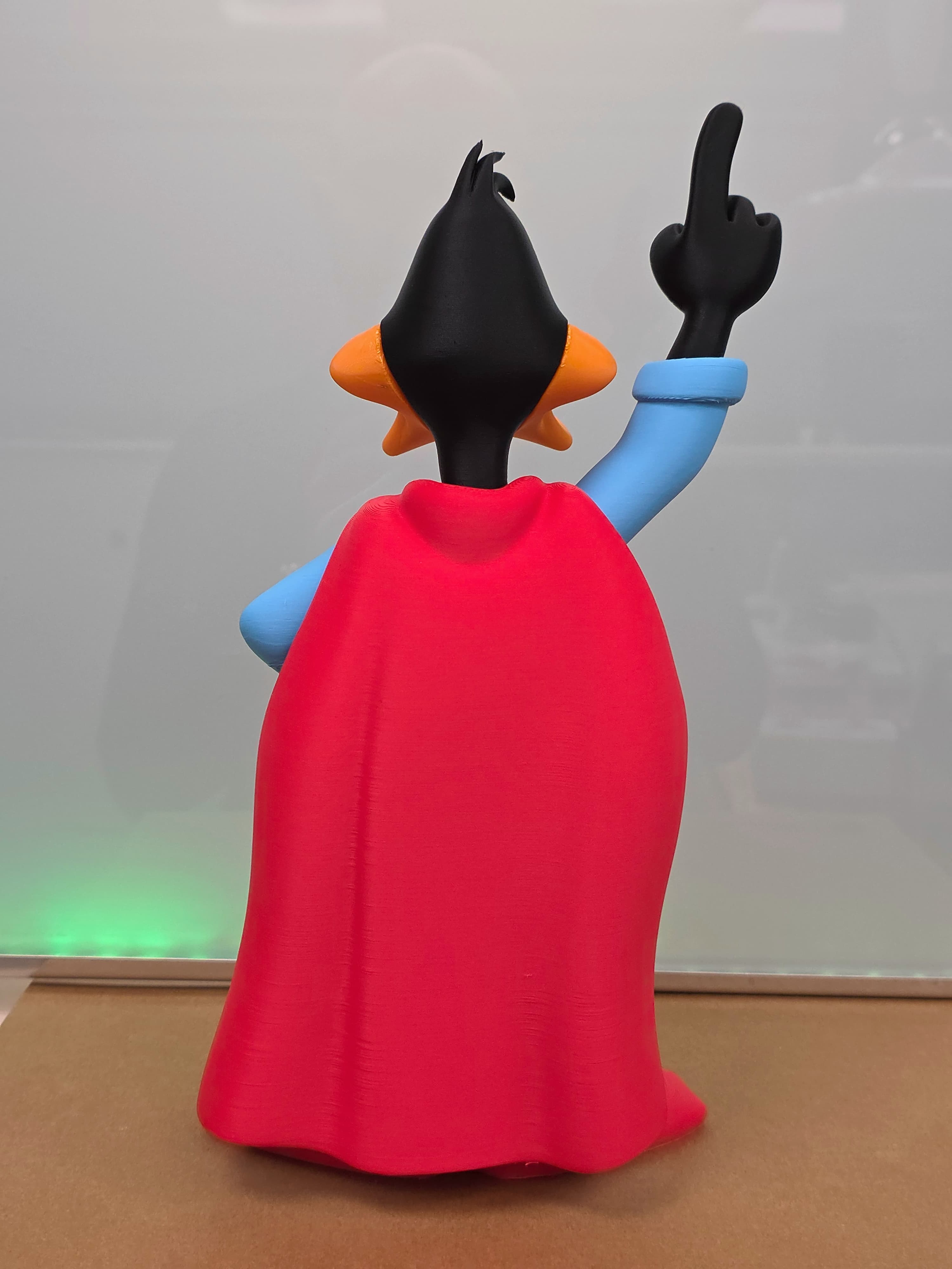 Daffy Duck en Superman — figurine multicolore